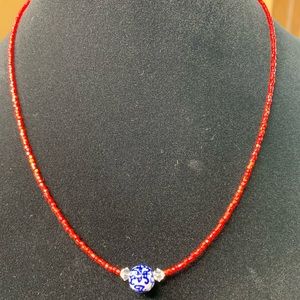 Casual beaded necklace with ceramic blue bead